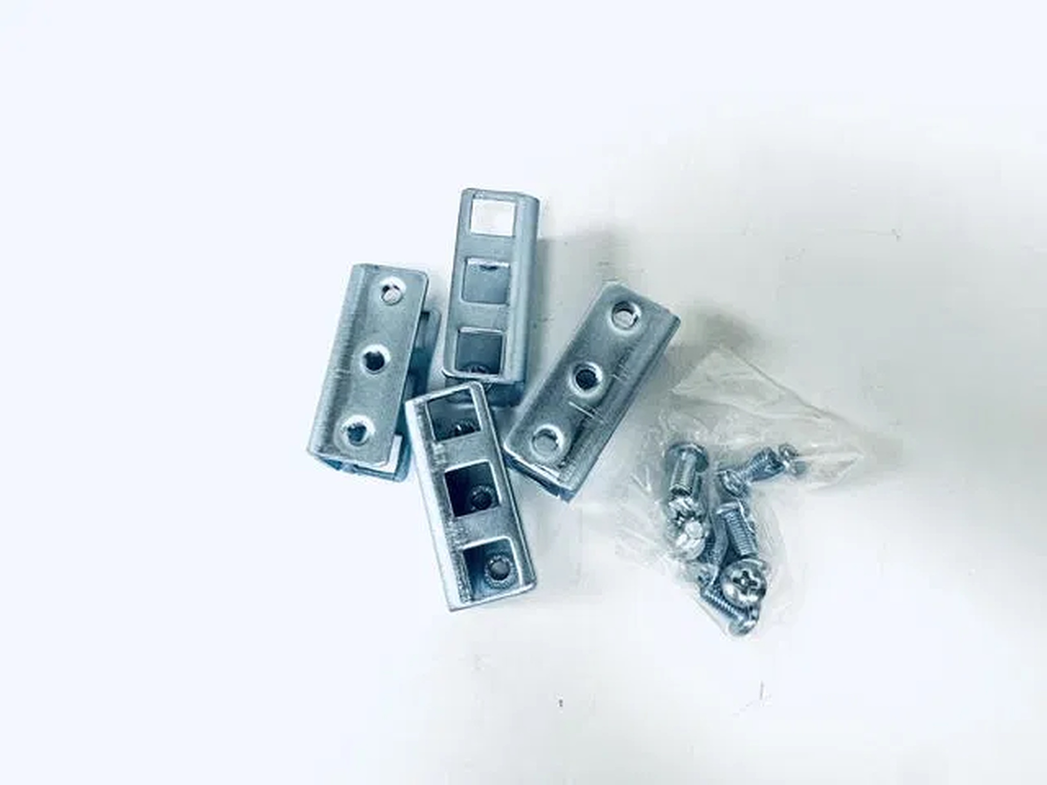 BR-1USQ1032 · 4-piece square-hole to threaded-hole adapter bracket set